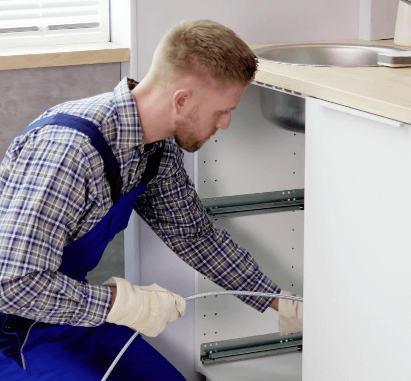 Cardinal Worker Clearing Blockages Image