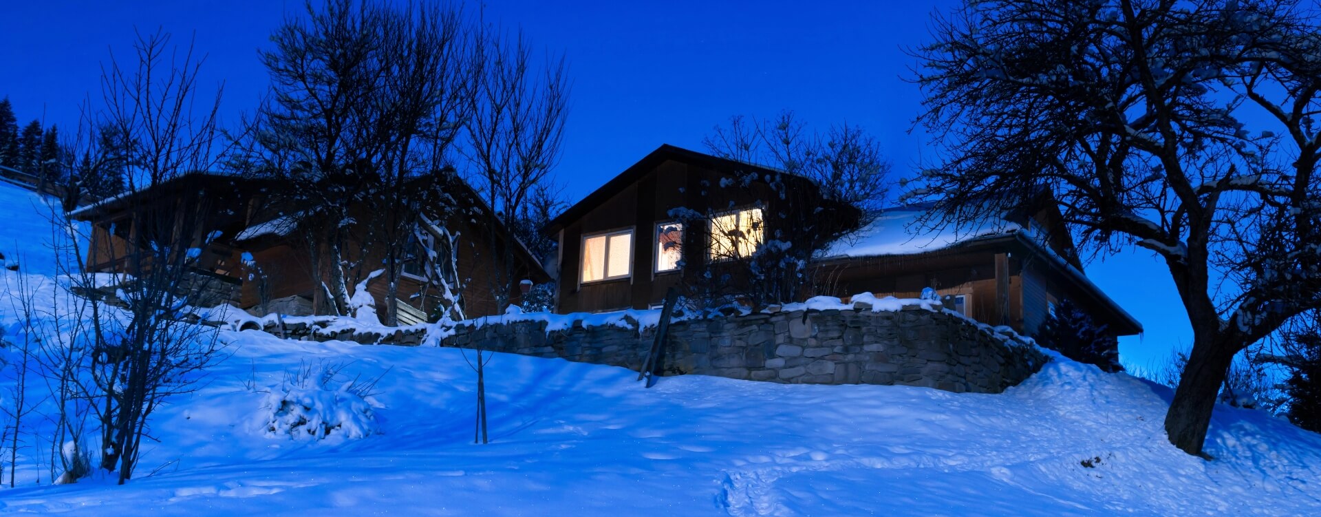 House made with wood and cover with snow image